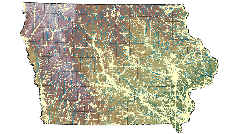 A map of Iowa with yellow dots indicating archaeological site locations