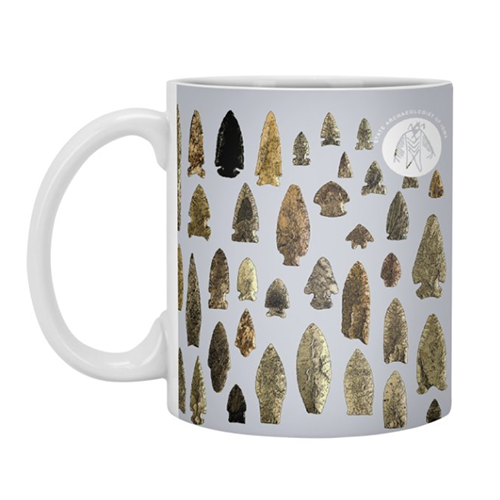 coffee mug covered in projectile point images